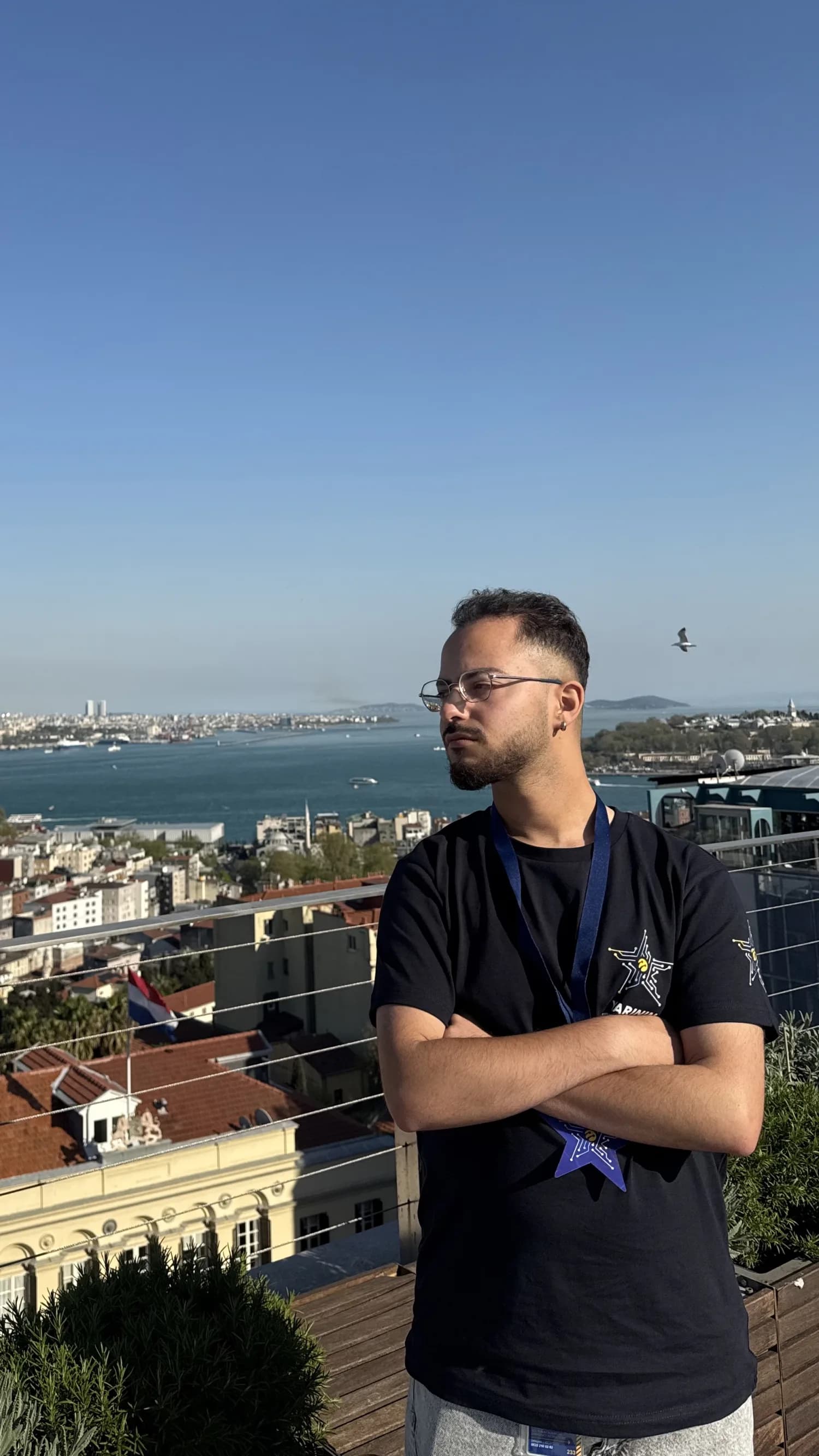 Ahmet Özgün Arkıner wearing a Turkcell finalist lanyard in Istanbul