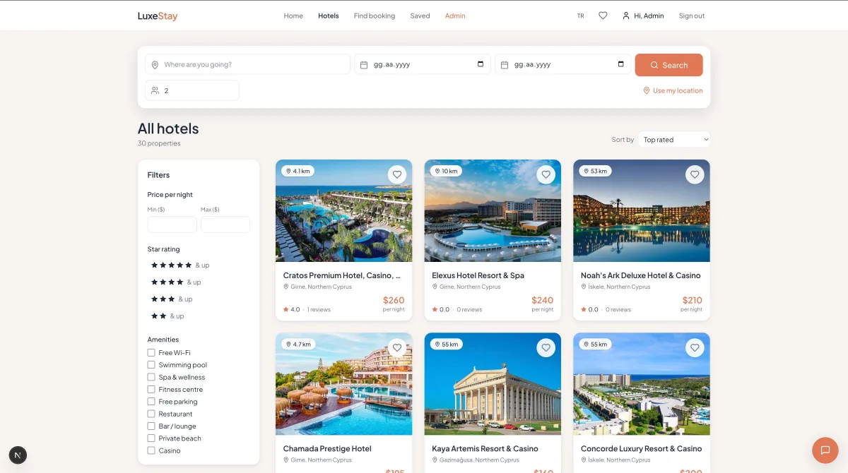 LuxeStay hotel detail page with rooms and amenities