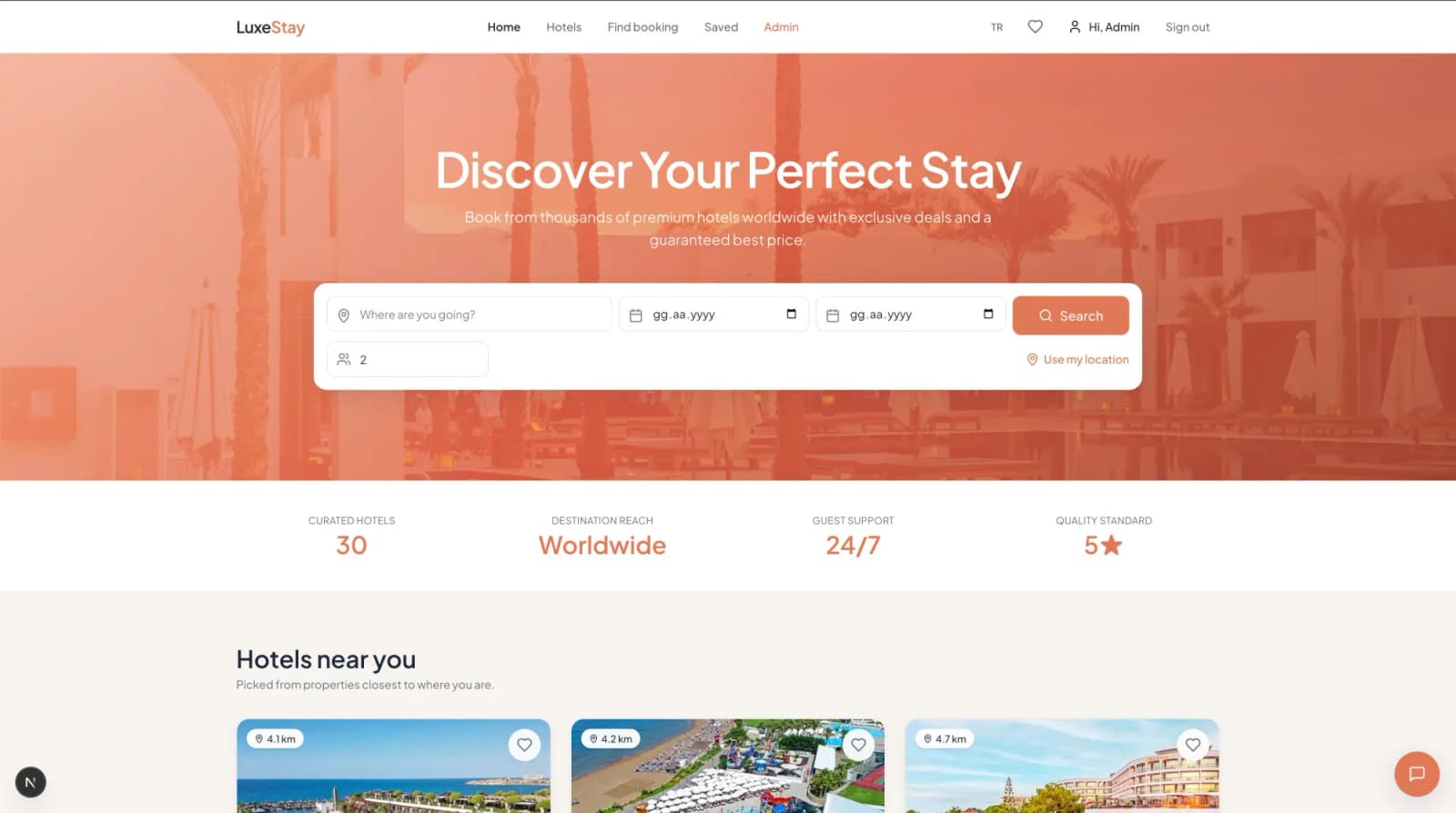 LuxeStay home page with a 'Discover Your Perfect Stay' hero and hotel search bar